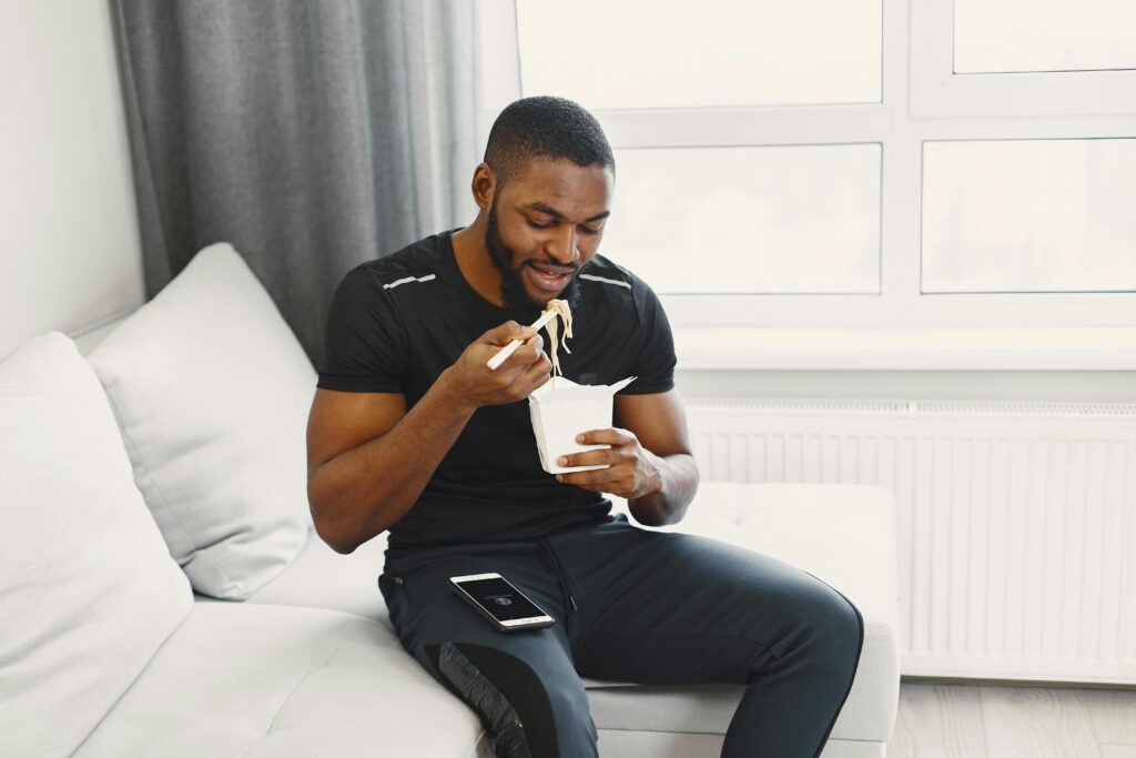 African American man eating
