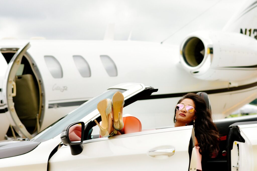 Woman in a nice car