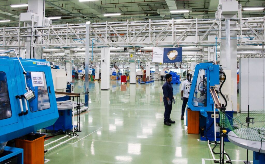 Workers at one of Panasonic Holdings Corp's factories